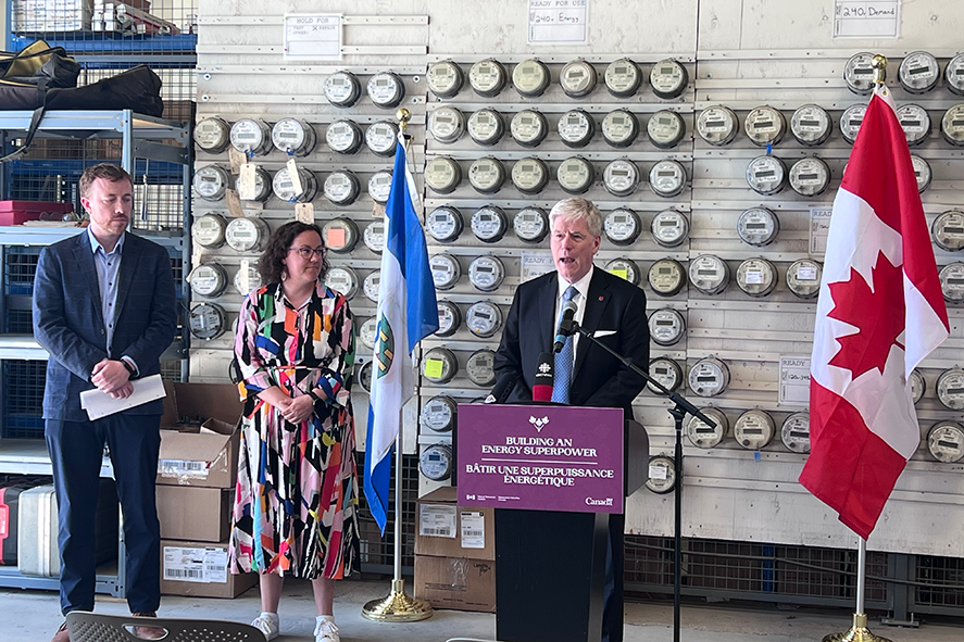 The Honourable Tim Hodgson, Minister of Energy and Natural Resources, Government of Canada speaking at the event